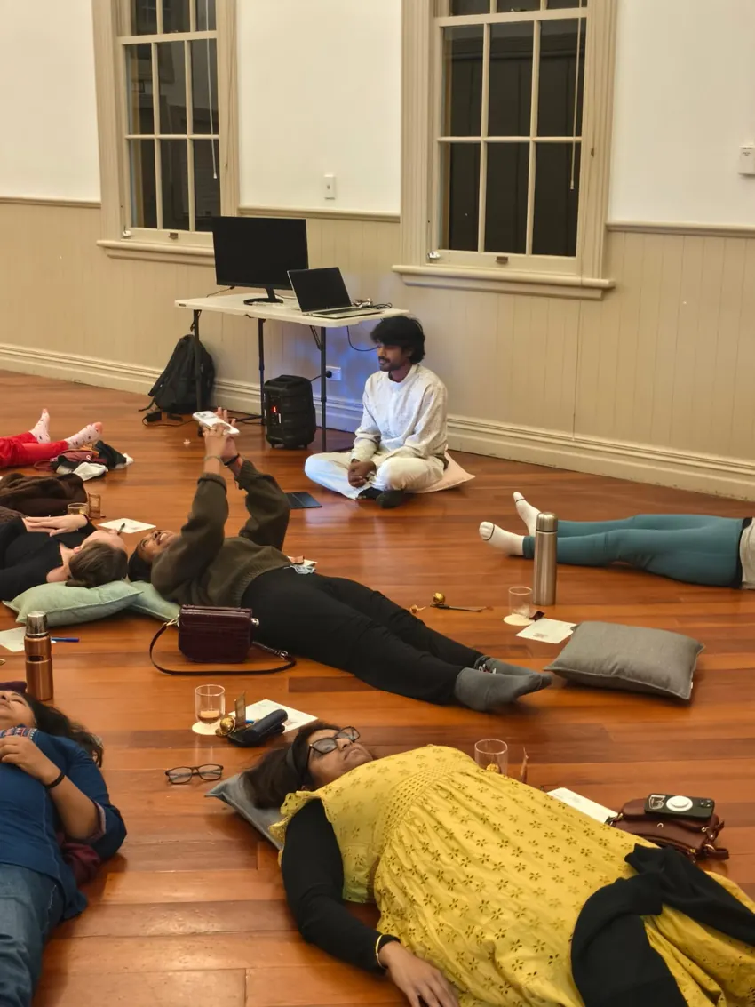 Participants resting during a guided relaxation activity